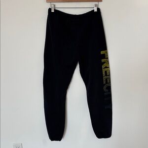 Freecity black Sweatpants yellow fade logo small